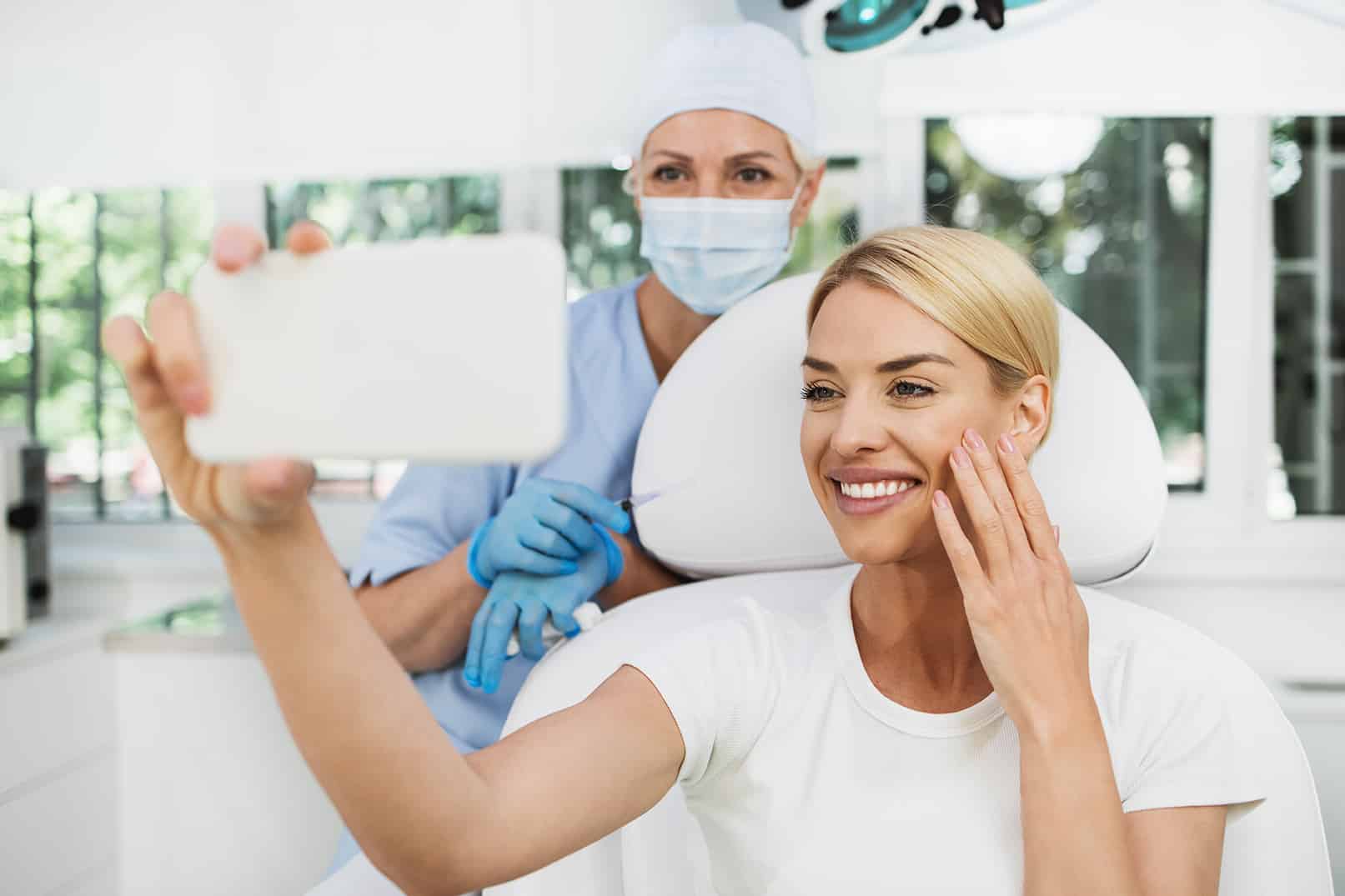 woman smiling during cosmetic dental bonding treatment at center ridge dental professionals